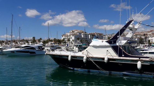 Spanish Marina in Puerto de La Duquesa in The Costa del Sol in Spain.
Camera = Static mid shot of boats