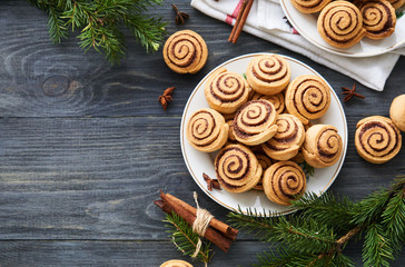 Homemade cinnamon cookies in the shape of a spiral on a plate