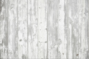 Old weathered wood surface with long boards lined up. Wooden planks on a wall or floor with grain and texture. Light neutral flat faded tones.