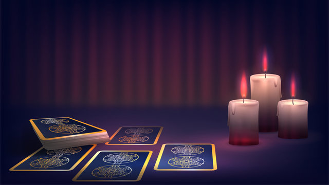 Tarot and candle on the fortune-teller's table, prediction of the future, dark magic