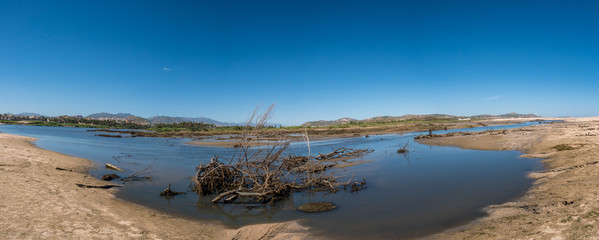 Panorama shot of a drying lake due to drought and global warming.