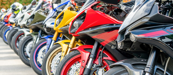 Motorcycles group parking on city street during adventure journey. Motorcyclists community travel...