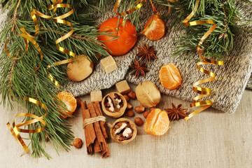 Still life formed with pine branches and New Year sweets	