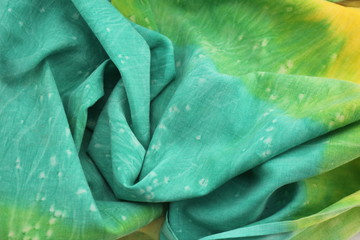 Rainbow Coloured Tie Dyed Fabric Background with Soft Focus