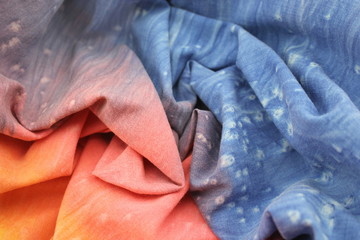 Rainbow Coloured Tie Dyed Fabric Background with Soft Focus