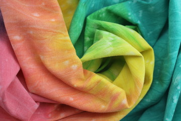 Rainbow Coloured Tie Dyed Fabric Background with Soft Focus