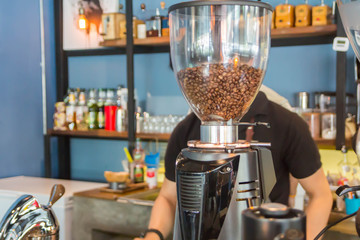 The atmosphere in a cafe with automatic coffee grinder and coffee maker equipment