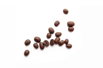 Roasted coffee beans on white background.