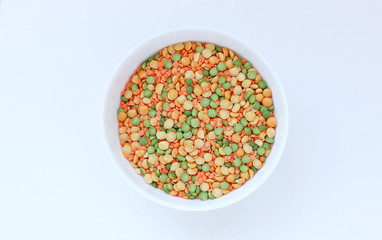 white plate with peas and lentils