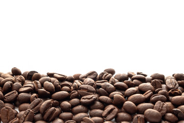 Roasted coffee beans for background with copy space area for text.