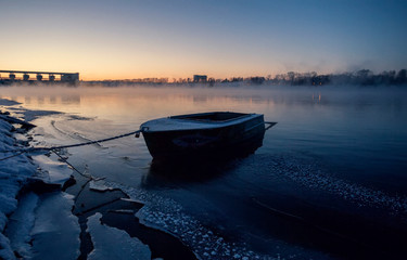 The boat on the river bank Volga.