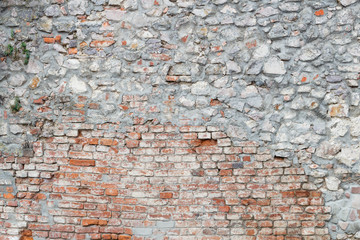 Old dirty red brick wall with concrete, texture