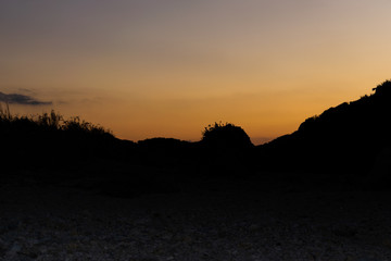 sunset next to a beach