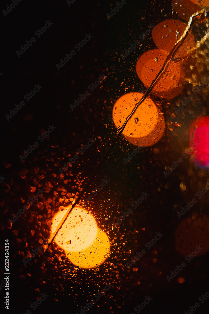 Poster black abstract background with bright colorful round bokeh