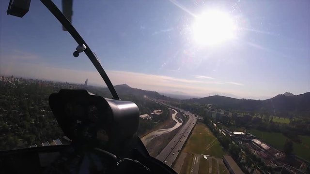 Helicoprer flying low over Santiago of Chile 1, in Ful HD at 60fps