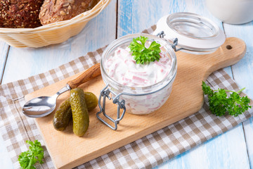 delicious homemade meat salad with mayonnaise and cucumber