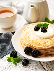 Delicious pancakes with blackberries