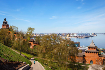 The Kremlin wall in Nizhny Novgorod is made of red brick. Kremlin on a hill overlooking the...