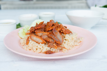 Barbecued red pork in sauce with rice