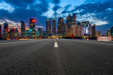 City skyscrapers and road asphalt pavement