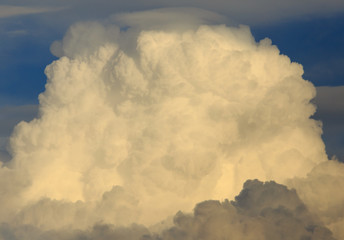 Clouds after rain before sunset as a background