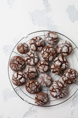 Chocolate brownie cookies in powdered sugar. Chocolate Crinkles.