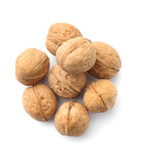 Tasty walnuts on white background