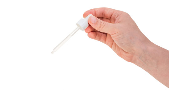 Hand Of Woman Is Holding Pipette With Liquid