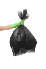 Woman holding garbage bag on white background