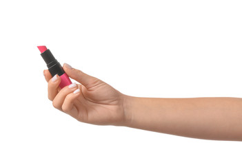 Woman holding color lipstick on white background