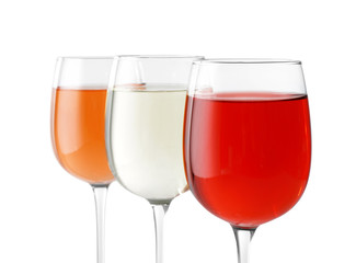 Glasses of different wine on white background