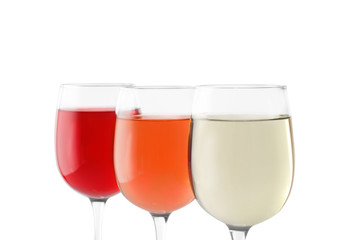Glasses of different wine on white background
