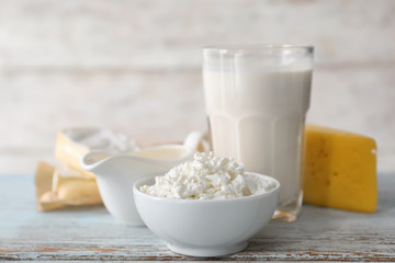 Different milk products on wooden table