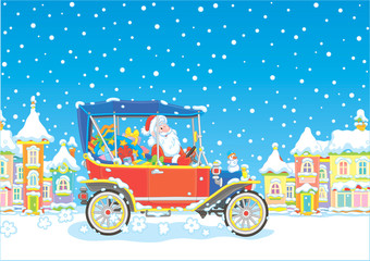 Santa Claus driving his car with Christmas gifts along a snow-covered town street, vector illustration in a cartoon style