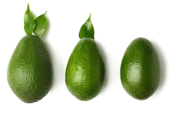 Ripe fresh avocados on white background