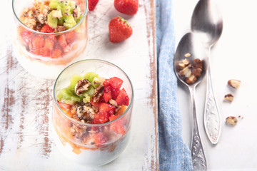 Yogurt in glass with fresh berries