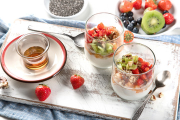 Yogurt in glass with fresh berries