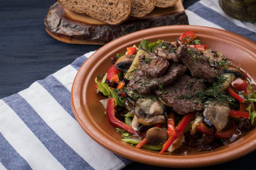 Grilled veal  with vegetables. Tasty meat salad with vegetables. Copyspace