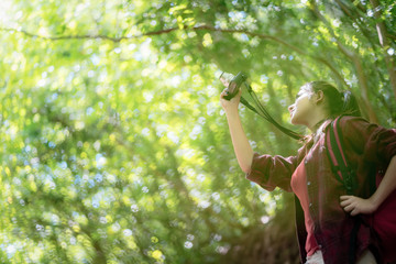 Hikers walking with backpack on a mountain at sunset. traveler going camping. travel concept.