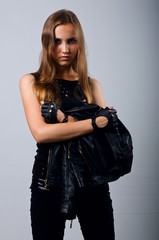 beautiful girl in leather jacket