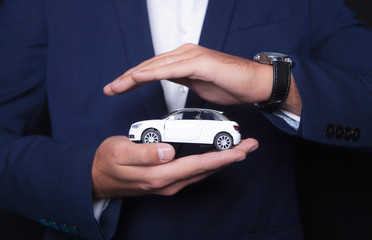 businessman keeps car