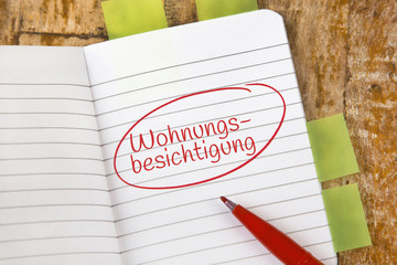 Eintrag im Notizbuch: Wohnungsbesichtigung