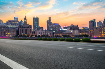 City skyscrapers and road asphalt pavement