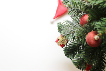 christmas tree with decorations ball and box gift on white background.selective focus at box