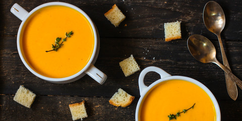 pumpkin soup (orange sweet potatoes). Healthy food. Copy space. Top view