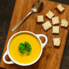 pumpkin soup (orange sweet potatoes). Healthy food. Copy space. Top view