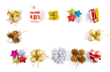 Christmas composition of decor balls, garland, red pink blue golden decorations reindeer on white background. Top view.