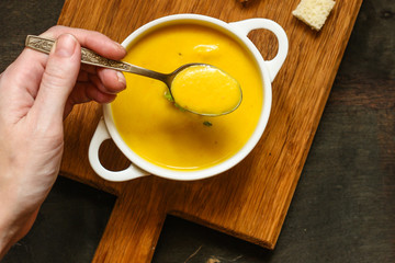 pumpkin soup (orange sweet potatoes). Healthy food. Copy space. Top view