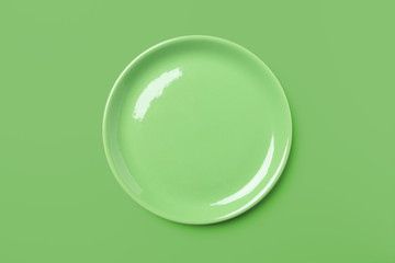 Green pastel plate on same colored background.