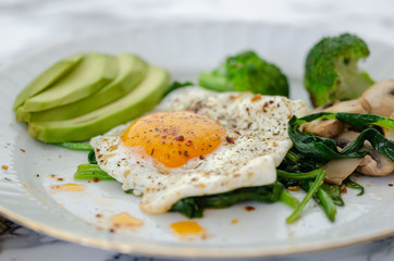 Healthy Homemade Breakfast with Eggs, Mushrooms,Broccoli and Spinach